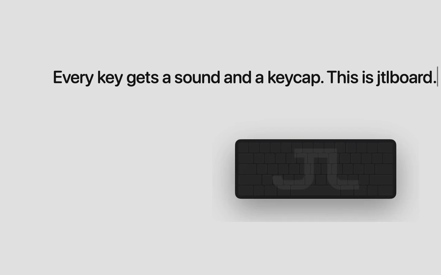 jtlboard on a Mac: the sentence typed, the mini keyboard in the corner, a key still lit